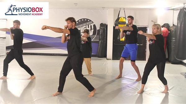 PhysioBox Movement Academy - Parkinson's boxing training session showing diverse participants practicing coordinated movements